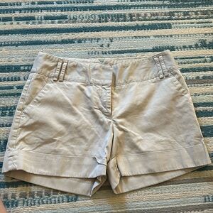 Express khaki shorts, size 6. I believe they are mid to high-rise.